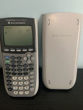Working TI-84 Plus Silver Edition Calculator by Texas Instruments